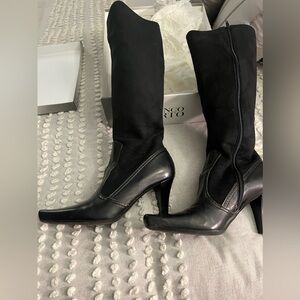 Women’s black heeled leather and suede boots
